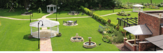 The landscaped gardens and gazebos of the Ramada Park Hall Hotel & Spa